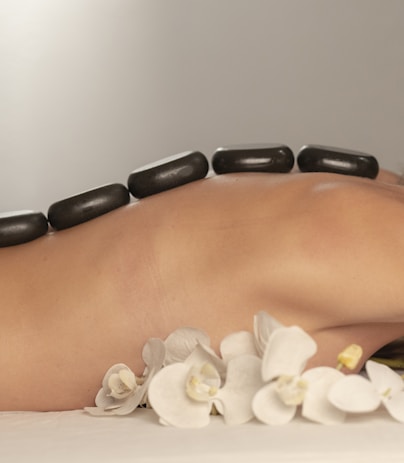 Spa treatment setup with essential oils and candles