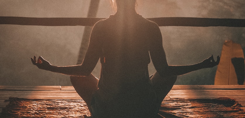 Guided yoga and meditation session in a peaceful outdoor setting